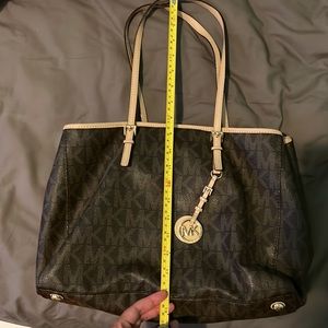 Michael Kors tote like new and clean barely used.